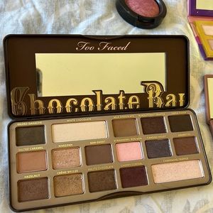 3 large eye shadow palettes, 2 mini, 1 blush